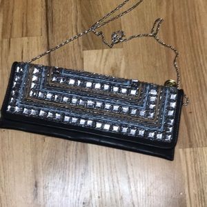 Black leather clutch with chain